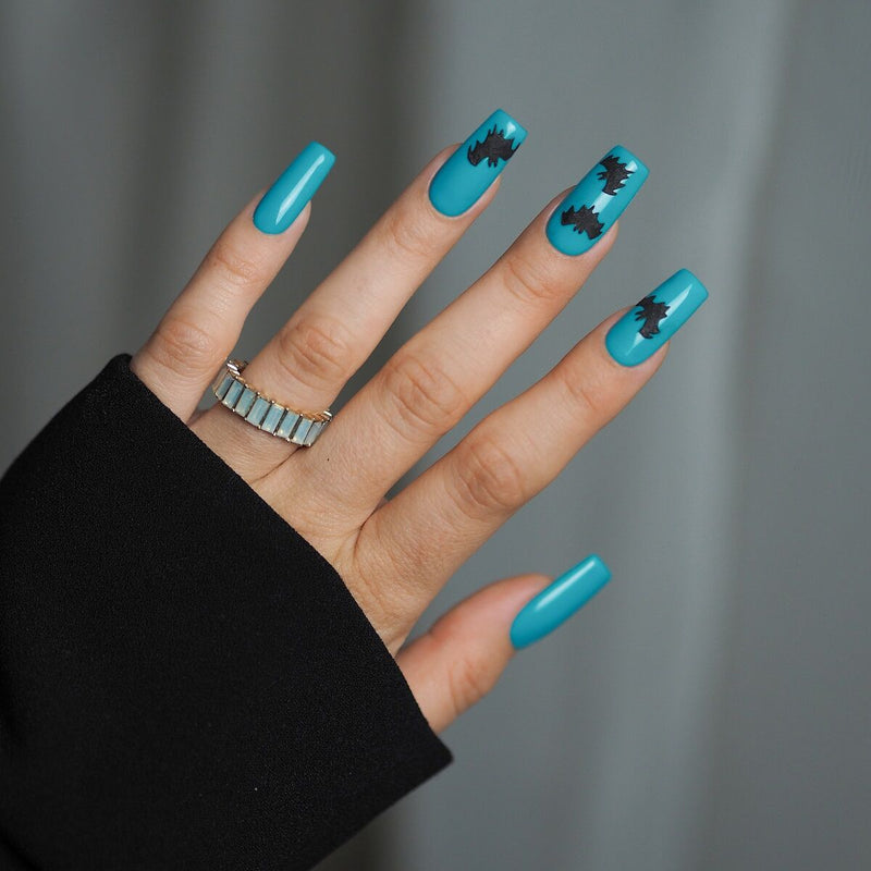 Semilac Halloween bat nail art with Spooky Blue glow-in-the-dark gel polish